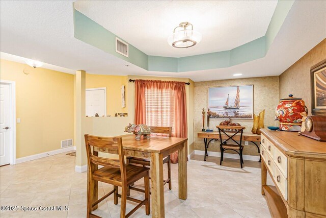 7008 Sevilla Ct Ph 505, Cape Canaveral, FL 32920 - dining area featuring baseboards and light tile patterned floors