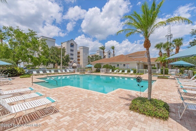 7008 Sevilla Ct Ph 505, Cape Canaveral, FL 32920 - community pool featuring fence and a patio