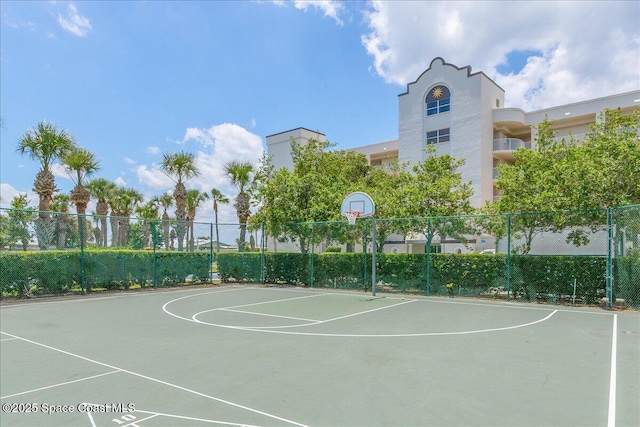 7008 Sevilla Ct Ph 505, Cape Canaveral, FL 32920 - view of basketball court featuring community basketball court and fence