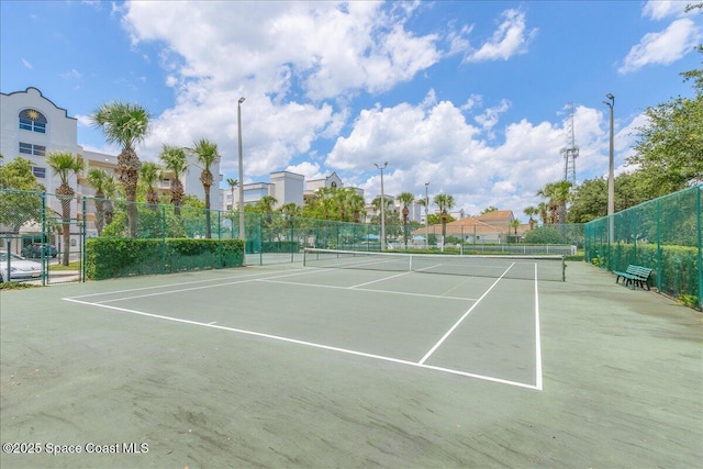 7008 Sevilla Ct Ph 505, Cape Canaveral, FL 32920 - view of tennis court featuring fence