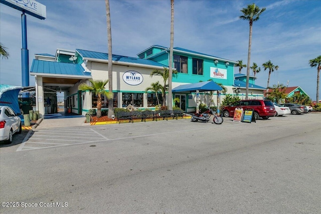 7008 Sevilla Ct Ph 505, Cape Canaveral, FL 32920 - view of commercial property featuring uncovered parking