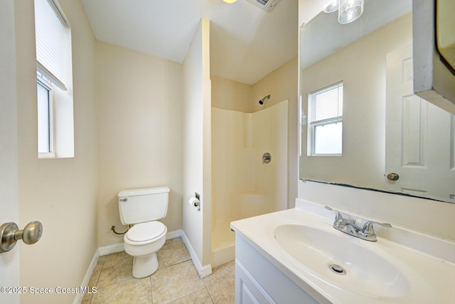 663 Bacon St, Cocoa, FL 32926 - bathroom with toilet, a shower, baseboards, vanity, and tile patterned floors