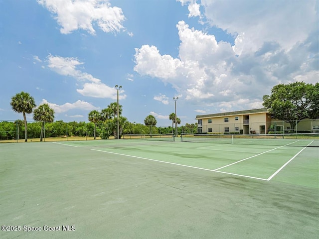 44 Vista Gardens Trl Unit 206, Vero Beach, FL 32962 - view of tennis court with fence