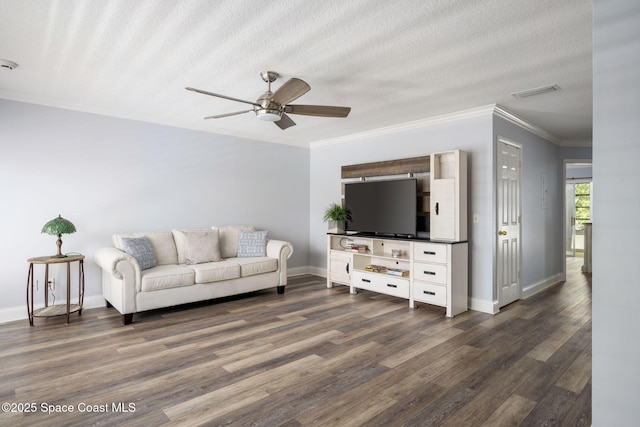 44 Vista Gardens Trl Unit 206, Vero Beach, FL 32962 - living area with dark wood finished floors, ceiling fan, baseboards, crown molding, and a textured ceiling