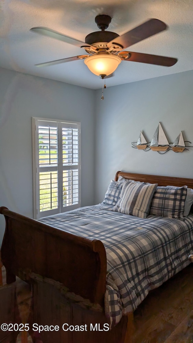 451 Dillard Dr SE, Palm Bay, FL 32909 - bedroom with ceiling fan