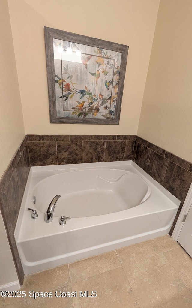 451 Dillard Dr SE, Palm Bay, FL 32909 - full bathroom with a garden tub and tile patterned floors