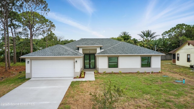 6002 Myrtle Dr, Ft Pierce, FL 34982 - view of front of property with a shingled roof, a garage, stucco siding, a front yard, and concrete driveway