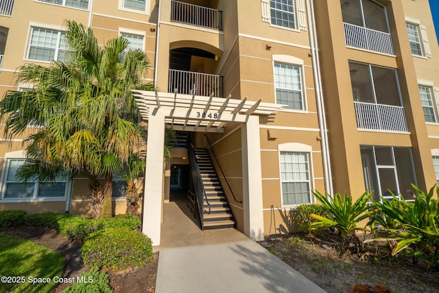 3848 Lexmark Ln Unit 307, Rockledge, FL 32955 - view of building exterior featuring stairway