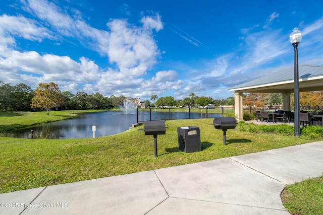 3848 Lexmark Ln Unit 307, Rockledge, FL 32955 - surrounding community with a water view and a gazebo