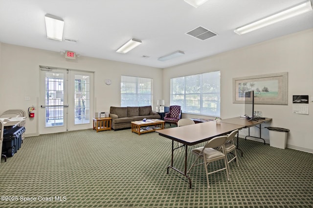 3848 Lexmark Ln Unit 307, Rockledge, FL 32955 - office area with carpet floors, baseboards, and french doors