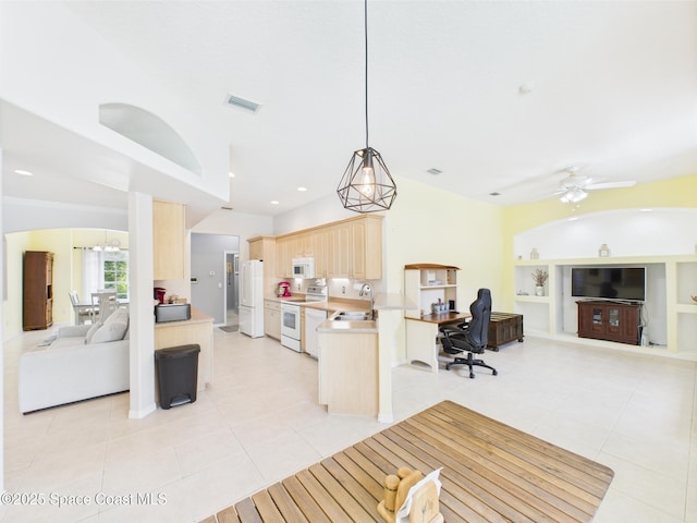 802 Clearmont St, Sebastian, FL 32958 - kitchen featuring light brown cabinets, open floor plan, white appliances, light tile patterned floors, and recessed lighting