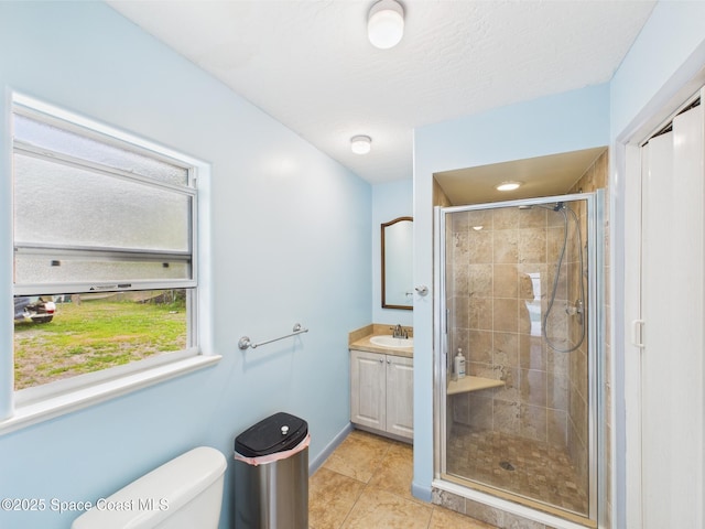 802 Clearmont St, Sebastian, FL 32958 - full bathroom featuring a stall shower, toilet, vanity, and tile patterned flooring