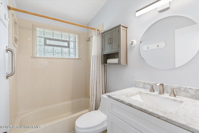 4805 Valdine Ave, Cocoa, FL 32926 - bathroom featuring shower / bath combo with shower curtain, toilet, and vanity