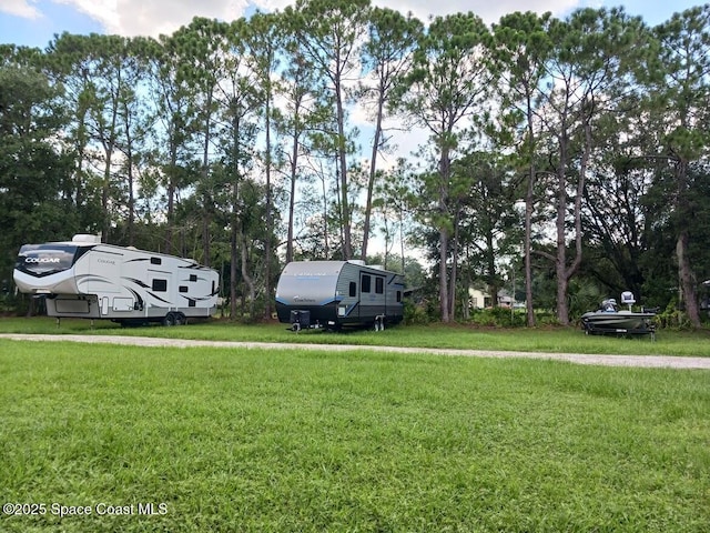 4805 Valdine Ave, Cocoa, FL 32926 - view of green lawn with view of scattered trees