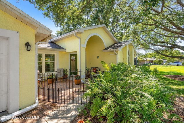 722 Hyannie St NE, Palm Bay, FL 32907 - entrance to property with stucco siding