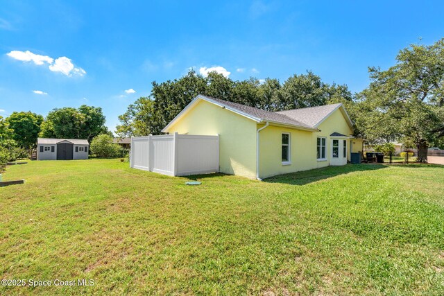 722 Hyannie St NE, Palm Bay, FL 32907 - view of home's exterior featuring stucco siding