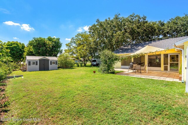 722 Hyannie St NE, Palm Bay, FL 32907 - view of green lawn featuring a patio area