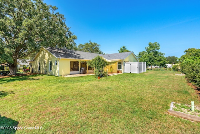 722 Hyannie St NE, Palm Bay, FL 32907 - back of house featuring a patio area