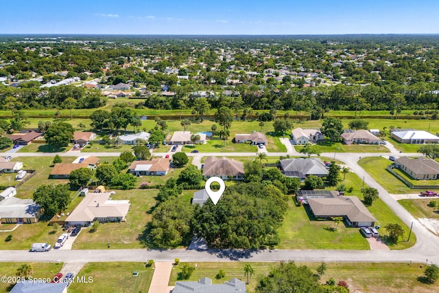 722 Hyannie St NE, Palm Bay, FL 32907 - aerial perspective of suburban area