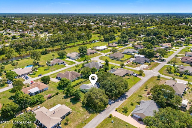 722 Hyannie St NE, Palm Bay, FL 32907 - aerial perspective of suburban area