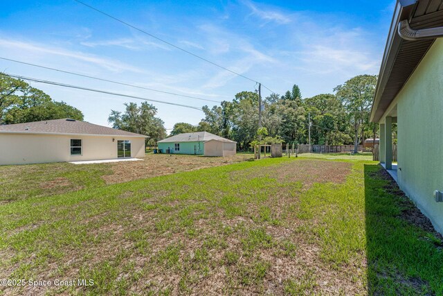 563 Holmes Ave NW, Palm Bay, FL 32907 - view of green lawn