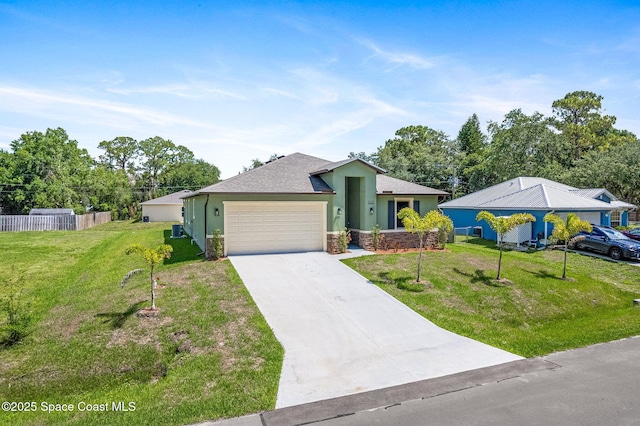 563 Holmes Ave NW, Palm Bay, FL 32907 - ranch-style home featuring a garage, stucco siding, concrete driveway, stone siding, and a shingled roof