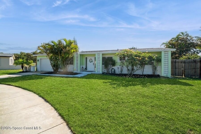 2160 Emerald Ct, Merritt Island, FL 32953 - single story home with an attached garage and concrete driveway