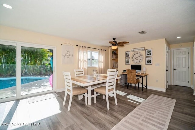 2160 Emerald Ct, Merritt Island, FL 32953 - dining space with baseboards, wood finished floors, a ceiling fan, and recessed lighting