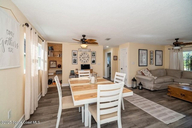 2160 Emerald Ct, Merritt Island, FL 32953 - dining space with ceiling fan, dark wood-type flooring, and baseboards