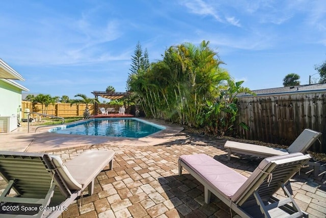 2160 Emerald Ct, Merritt Island, FL 32953 - view of pool featuring a patio, a fenced backyard, and a pergola