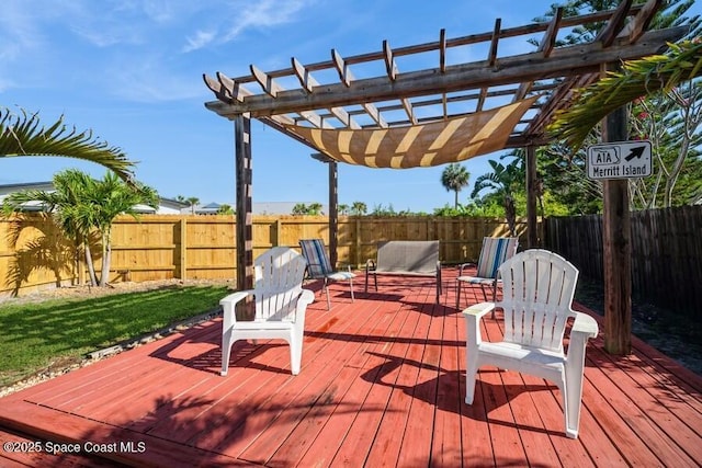 2160 Emerald Ct, Merritt Island, FL 32953 - wooden terrace with a pergola and a fenced backyard