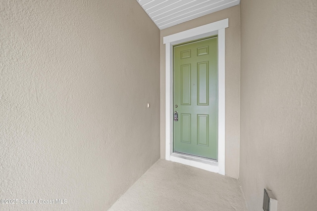 1662 Orsi Pl, West Melbourne, FL 32904 - doorway to property featuring stucco siding