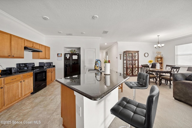 1662 Orsi Pl, West Melbourne, FL 32904 - kitchen with black appliances, under cabinet range hood, a sink, ornamental molding, and a chandelier
