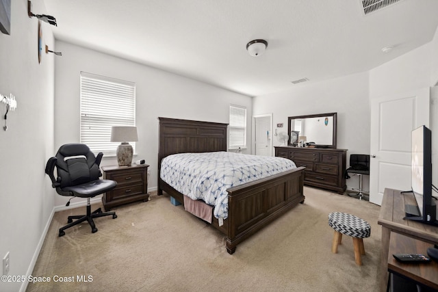 1662 Orsi Pl, West Melbourne, FL 32904 - bedroom with light colored carpet, baseboards, and an office area