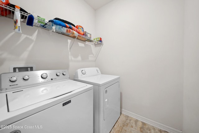 1662 Orsi Pl, West Melbourne, FL 32904 - laundry area with independent washer and dryer and baseboards