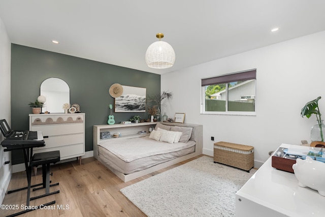 3204 Nottingham Ln, Cocoa, FL 32926 - bedroom featuring wood finished floors, recessed lighting, and baseboards