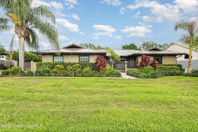 3204 Nottingham Ln, Cocoa, FL 32926 - ranch-style home with stucco siding, a standing seam roof, and metal roof