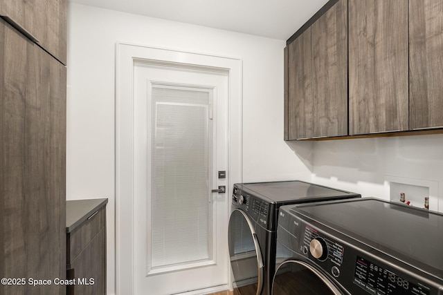 3204 Nottingham Ln, Cocoa, FL 32926 - washroom featuring cabinet space and separate washer and dryer