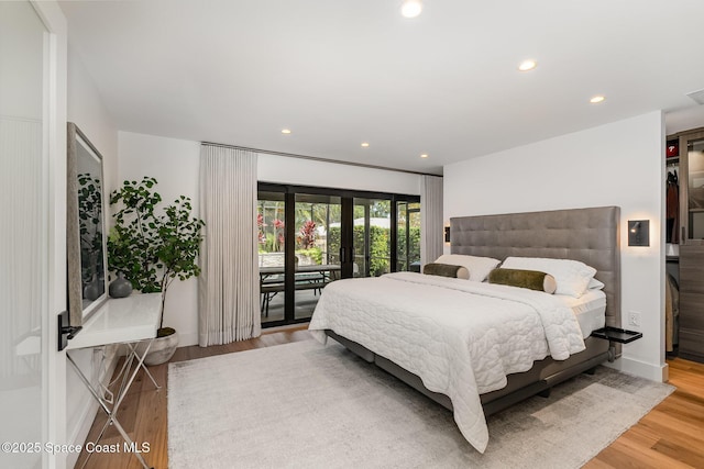 3204 Nottingham Ln, Cocoa, FL 32926 - bedroom with access to exterior, wood finished floors, french doors, and recessed lighting