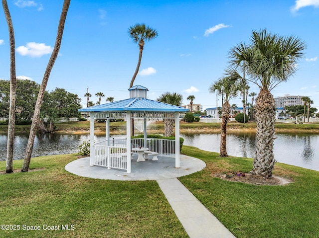 3165 N Atlantic Ave Unit C206, Cocoa Beach, FL 32931 - view of home's community with a gazebo, a lawn, and a water view