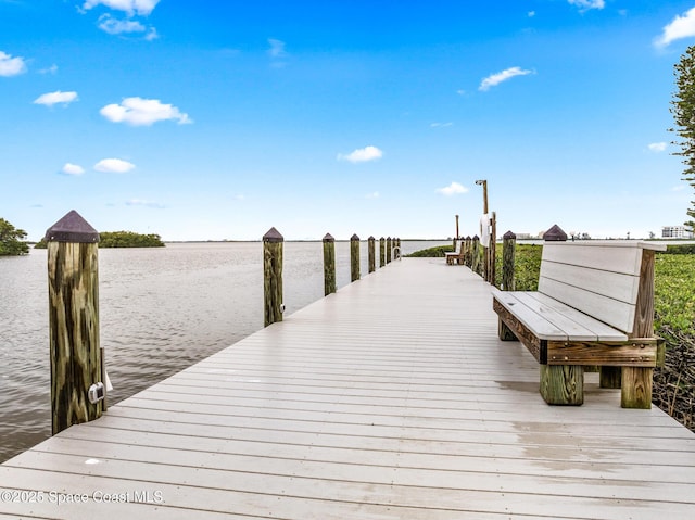 3165 N Atlantic Ave Unit C206, Cocoa Beach, FL 32931 - dock area featuring a water view
