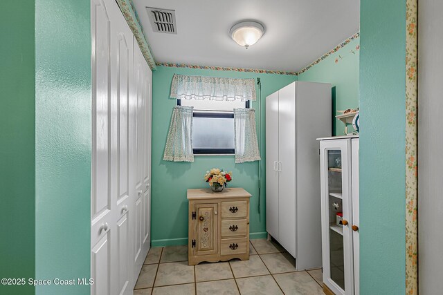 3165 N Atlantic Ave Unit C206, Cocoa Beach, FL 32931 - bathroom with tile patterned flooring