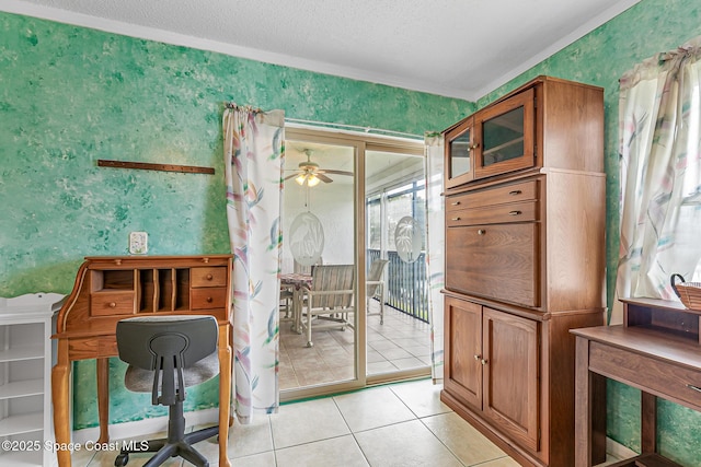 3165 N Atlantic Ave Unit C206, Cocoa Beach, FL 32931 - office area featuring wallpapered walls, light tile patterned floors, a ceiling fan, a textured ceiling, and crown molding