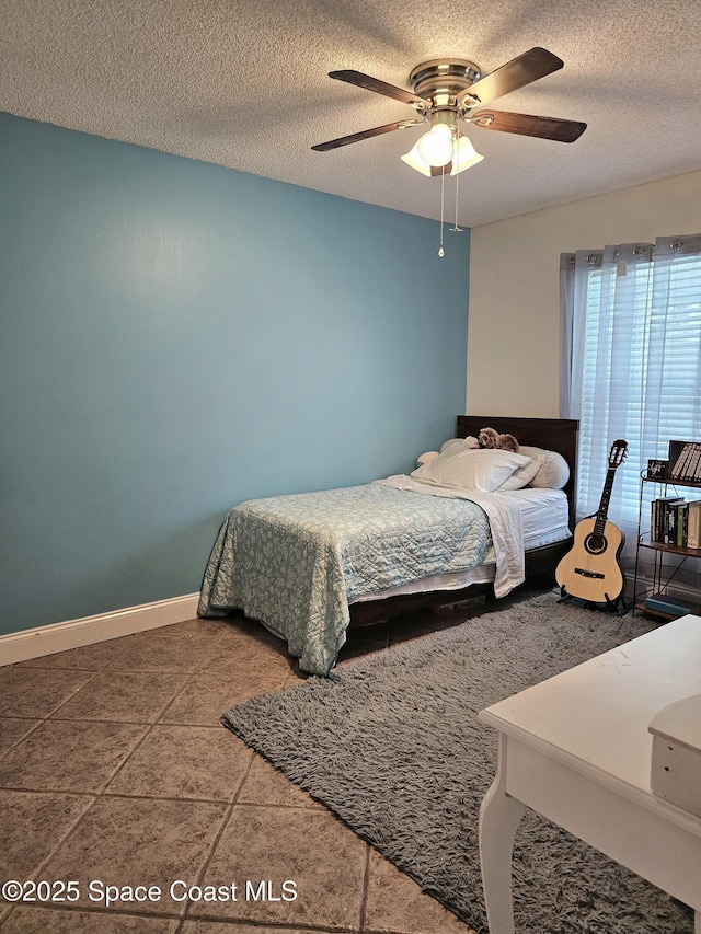 6630 Cecil Rd, Cocoa, FL 32927 - bedroom featuring a textured ceiling and ceiling fan