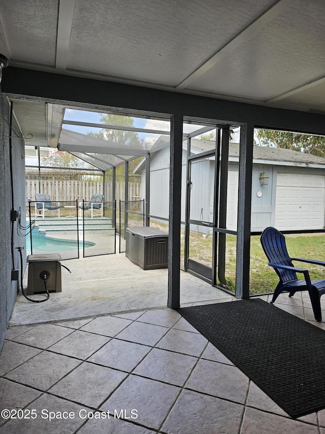 6630 Cecil Rd, Cocoa, FL 32927 - view of patio / terrace with glass enclosure and an outbuilding