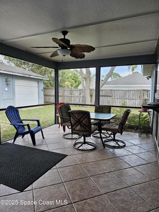 6630 Cecil Rd, Cocoa, FL 32927 - sunroom / solarium featuring outdoor dining area and ceiling fan