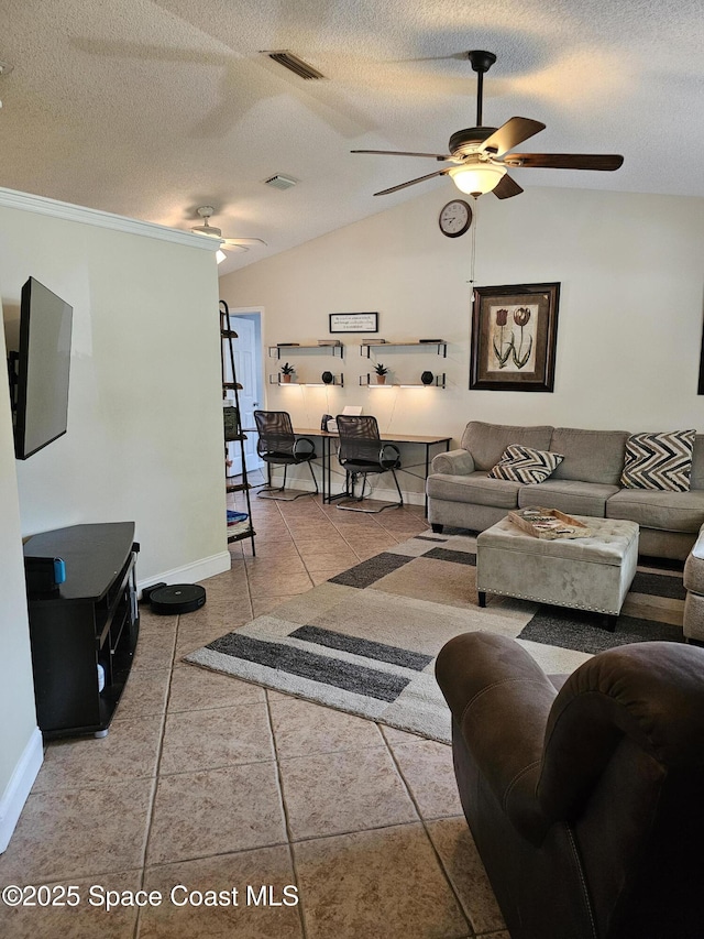 6630 Cecil Rd, Cocoa, FL 32927 - tiled living room with ceiling fan, a textured ceiling, and lofted ceiling