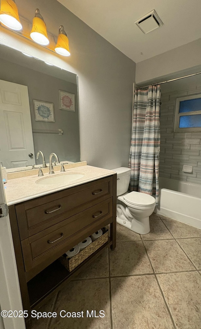 6630 Cecil Rd, Cocoa, FL 32927 - bathroom featuring vanity, tile patterned floors, and shower / bathtub combination with curtain