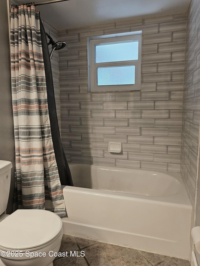 6630 Cecil Rd, Cocoa, FL 32927 - bathroom featuring shower / bath combination with curtain and tile patterned flooring