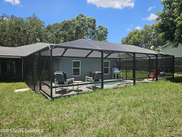 6630 Cecil Rd, Cocoa, FL 32927 - back of property with an outdoor pool, a lanai, and a patio area